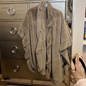 Warm and Chic tan shawl. one size fits all. Never worn! Very soft.